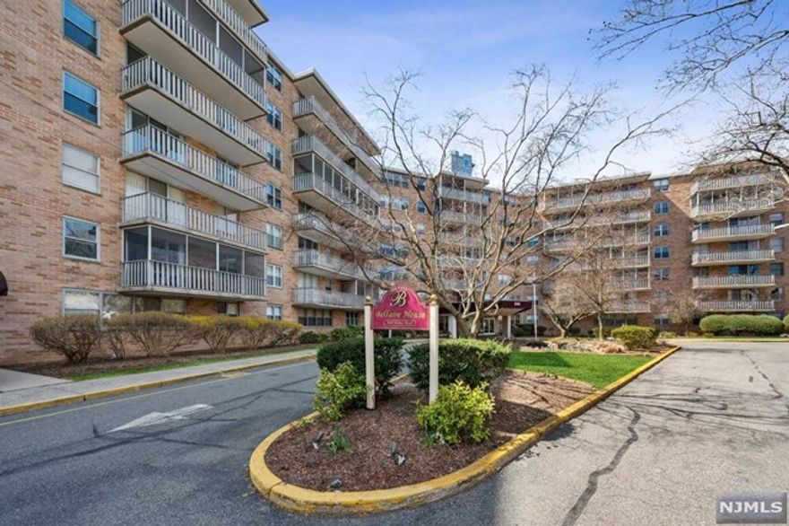 Ideally located one bedroom unit on the 6th Floor of Up Montclair's sought after Bellaire House. Just a short stroll to restaurants, supermarkets, shopping and Anderson Park. Bellaire House is full service building with everything you need: 24/7 doorman service, elevator, pool, dog-walk, patio/barbecue area and site building manager. The gorgeous kitchen offers stainless appliances including wine cooler, crisp white cabinetry and grey quartz counter tops. Motorized shades in both the living room and bedroom add a touch of modern comfort. Spacious layout offers large living room/dining room combination with balcony perfect for enjoying the morning sunrise. The bedroom is generous with plenty of closet space. Utilities included in maintenance fee. Washer/dryer on each floor. Pets up to 30 pounds allowed; - Storage space available in basement, Garage parking $70 per month -waiting list. Outside parking $40 per month. Easy commute! Close to NY Midtown direct train and buses.