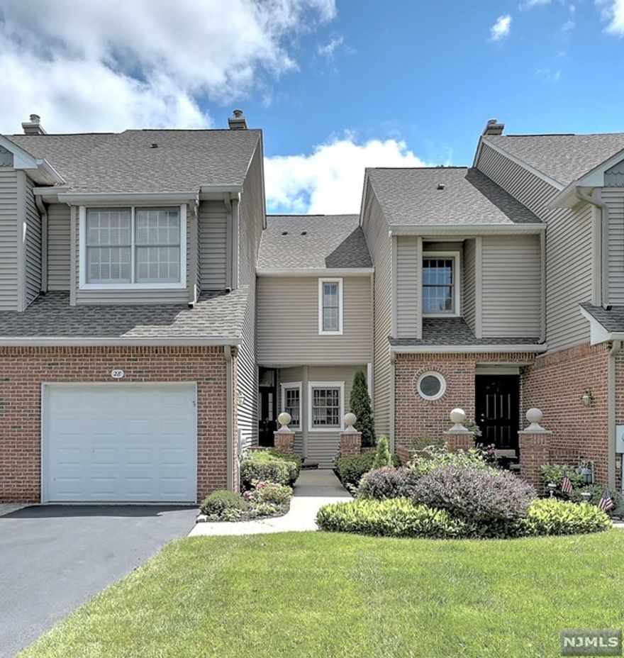 Prime Location! Enjoy privacy & modern updates on quiet street, just a short walk to pickleball, tennis courts & recently refurbished in-ground pool. Gourmet kitchen w/abundant cabinets, granite counters, Viking appliances including range, dishwasher, vented exhaust, & Jenn-Air refrigerator. Beautiful 3/4" Brazilian cherry flooring on main level; built-in speakers provide music from the included sound system. DR w/elegant wainscoting & slider access to renovated, low-maintenance deck w/privacy fencing & natural gas line for grill. LR w/vaulted ceilings & Fireplace with marble surround. Primary BR offers multiple closets & private full bath w/double vanity & stall shower. 2nd BR with en suite bath. Finished basement has high ceilings, family room with a 5.1 home audio system, wet bar w/wine fridge, office/game room & half bath. Utility Rm provides ample storage. This home ensures a serene and private living experience, with front & rear views that do not overlook neighboring units.