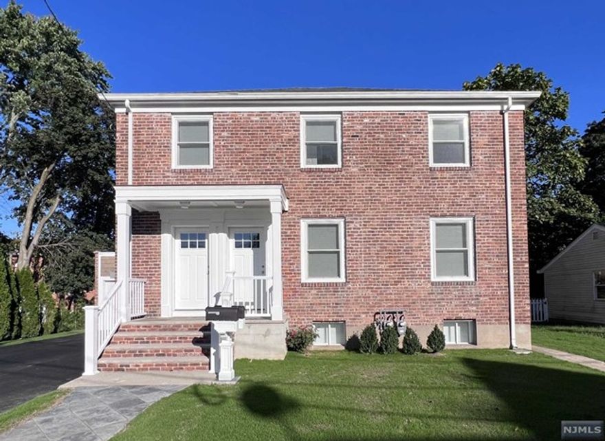 STUNNING, FULLY RENOVATED LUXURY APARTMENT offers an expansive two-floor living space with endless possibilities as well as potential to add another bedroom if desired. Spacious 1st floor offers large living room, beautiful kitchen featuring stunning quartz countertops and premium stainless steel appliances, dining room w/doors to the backyard, bedroom, and contemporary full bathroom. The ground floor offers spacious family/rec-room, a second kitchen, a full bathroom, and laundry room. Ground floor convenient access from both the first-floor kitchen and a separate side door. Other features include recessed lighting, beautiful hardwood floors, backyard, central air, plenty of storage, energy-efficient spray foam insulation, 3 parking spaces. Just steps away from beautiful parks, restaurants, stores, and theaters and, great commute! Don't miss out on this extraordinary opportunity!