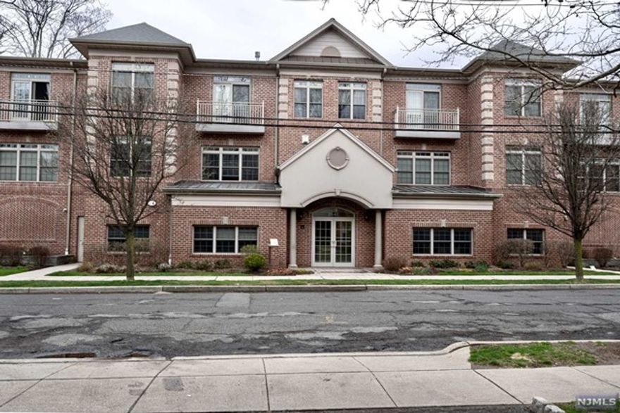 Rare Find. Act fast, will go soon. Luxury living in the Heart of South Orange, sun drenched front unit with two bedrooms, two full baths and a balcony comes with one parking spot. Condo with elevator, secured access to building. Third floor unit, 10-foot ceilings, crown molding, ceiling fans, open concept living/dining area, fireplace & new water heater. The kitchen features granite counter tops & stainless steel appliances. Master suite has a full bathroom with dual sinks & a large shower. A walk-in closet & a second closet provide plenty of storage space. One additional bedroom & a second full bath make this home ideal for everyone. Special features include in-unit newer laundry washer/dryer & an underground garage space. It is steps away from the Midtown Direct train to NYC. This terrific location is close to amazing restaurants, gourmet grocery, Starbucks, Parks and Pools, South Orange Performing Arts Center and all that downtown South Orange has to offer.