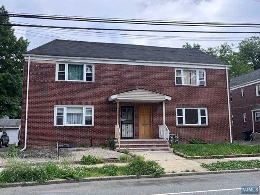 First Floor of duplex home featuring living room, dining room, kitchen, 2 Bedrooms. freshly painted and floor just finished. 2 parking spaces on driveway. Near major highways, shopping, and transportation.