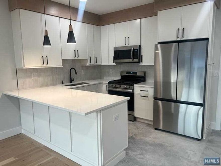 Welcome to this newly built two bedroom apartment for rent located in Newark, NJ with a short distance to public transportation. This unit offers one bedroom, one bathroom, a modern open concept kitchen and living room area. Other features that this unit offers are the refrigerator, microwave, dishwasher and a comfortable space for the connections of your washing machines, and parking space optional for $150 additional fee per month. It is conveniently located half a block from Ferry Street and major transit routes, close to restaurants and small shops.