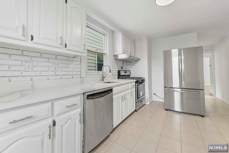 Commuter's Dream! Welcome Home to this beautifully renovated 2 Bedroom/1 Full Bath spacious unit in prime location. Brand NEW kitchen with Quartz Countertops & Stainless Steel Appliances. Convenient access to Washer/Dryer in Basement & plenty of room for Storage. Bonus room for home office. Close proximity to public transportation, 15 minute bus ride to NYC!! Quick access to Highways, Rt 3 & I95, making it a 10 minute drive to Manhattan. Don't miss your opportunity with this gem, book your showing today!