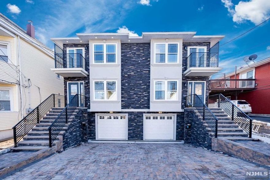 Remarkable brand new construction duplex home (side-by-side) featuring over 2,200 sqft. of living space. Great townhouse alternative with $0 monthly maintenance fee! Step inside to a stunning living room and dining room featuring open space layout. Gourmet kitchen with an island and wet bar followed by a sliding door to rear deck and yard as well as powder room to complete first floor. The second floor features a spacious master bedroom w/ balcony, modern master bathroom and two walk-in closets. Additional 2 spacious bedrooms, full bath w/shower & tub and laundry room on the same level. Bonus finished ground level room great for entertaining and/or office with access to the garage. Attached garage and driveway. Exceptional exterior finishes with stone and stucco, engineered hardwood floors throughout, modern glass railings and much more! Extraordinary quality of craftsmanship! Excellent for commuters - located less than a mile to Plauderville Train Station!