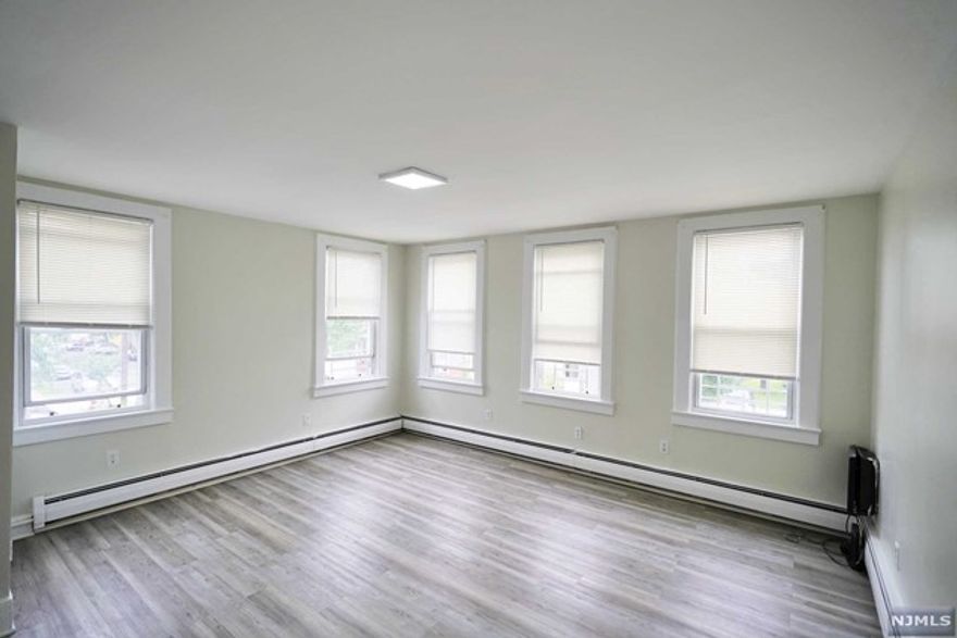 Beautiful renovated huge 1 bedroom fits 2 Queen size beds, large living room, Eat-in kitchen, and 3rd floor spacious attic storage. Heat & Hot water included.