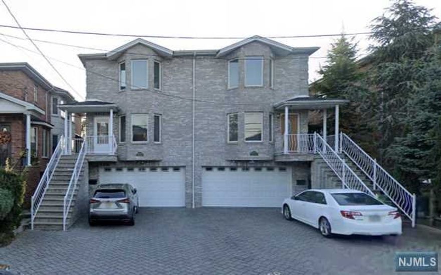 LOCATION, LOCATION, LOCATION! Welcome home to this well-maintained, never-rented, rare duplex unit offering the perfect blend of convenience and quiet privacy. This spacious home features 3 bedrooms and 3.5 bathrooms, boasting an open layout, central AC, hardwood floors, and skylights. The master bedroom includes an en-suite bathroom. Enjoy a ground-level family room with a side entrance, a 2-car garage, a deck, and a private paved backyard. The spacious paved driveway adds convenience. Located in a quiet neighborhood, this home is just a short walk to all NYC transit options, shops, and the library.