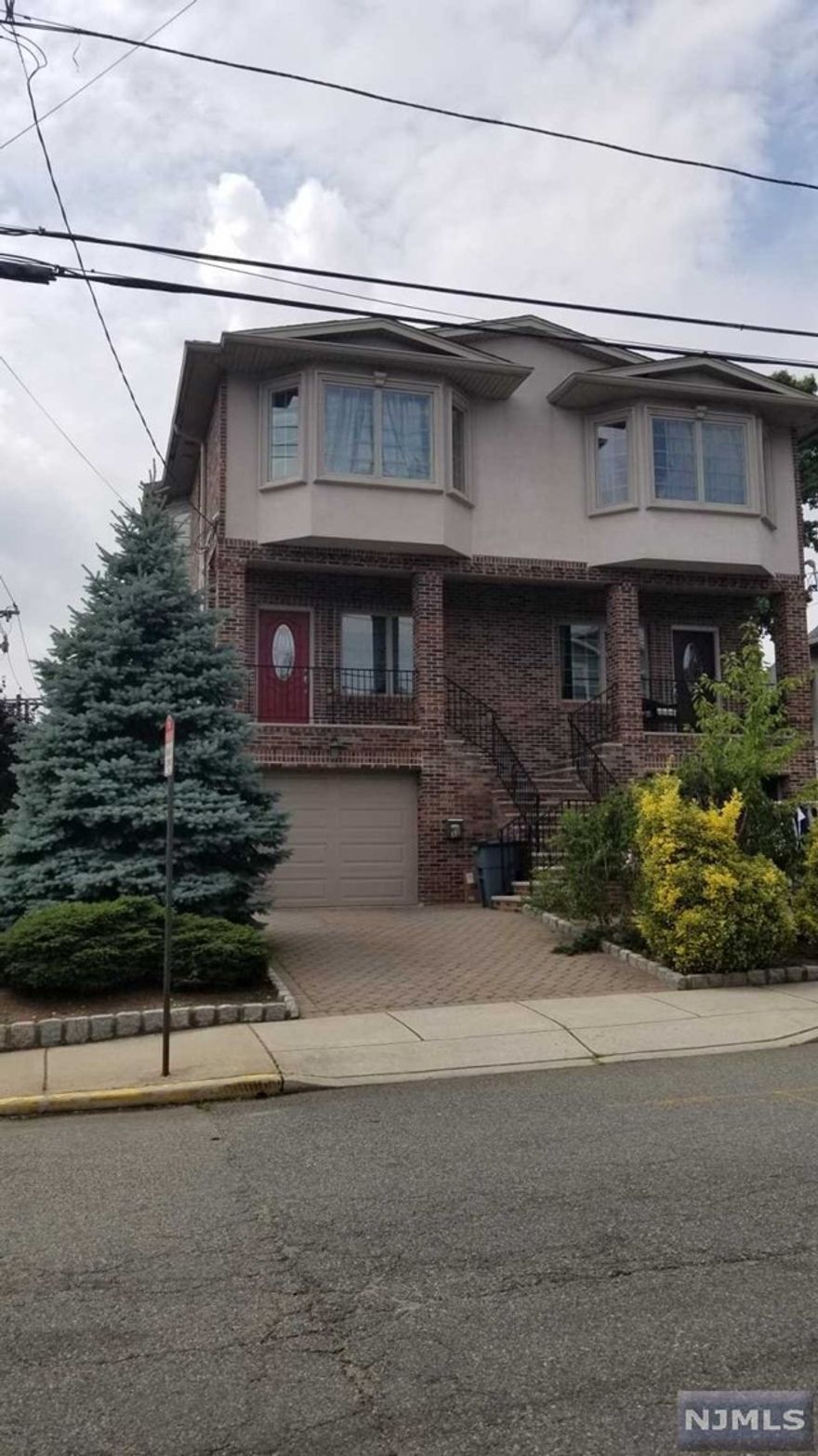 Young Half duplex located on east side of Palisade Ave, East, North , South facing brings lots of natural sunlight. Open Floor plan with hardwood floor thru out the house. Modern eat in kitchen with breakfast area and sliding doors to the deck. Primary bedroom with master bathroom with shower stall, , 3 nice size closets, 2 other bedrooms, hallway full bathroom, laundry ( new washer & Dryer) consist of second floor. Finished ground floor with generous size rec room/ family room, powder room, oversized garage and patio thru sliding glass door. Convenient location for NYC transit, school, down town, dining,,,,