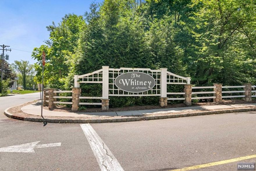 Spacious, 2045 sq ft Townhouse in the premier gated Whitney Community. Birch model, an end unit with many upgrades. Gourmet kitchen with granite countertops, plenty of cabinets, and stainless steel appliances. The first floor features a formal dining room, powder room, and a family room with a gas fireplace. The second floor features the primary suite with tray ceilings, an attached bathroom, double vanities, a separate tub and shower, and 2 walk-in closets. Two additional large bedrooms able to fit queen-sized beds and desks, a second full bathroom, and laundry all on the second level. This unit also has hardwood floors throughout, a one-car attached garage, central vacuum, and pull-down stairs to an attic for additional storage. Complex amenities include a clubhouse with a full gym, outdoor heated pool, children's playground, and extra guest parking. Close to NYC transportation in a town with top-rated schools. Don't miss the chance to get into a wonderful town.