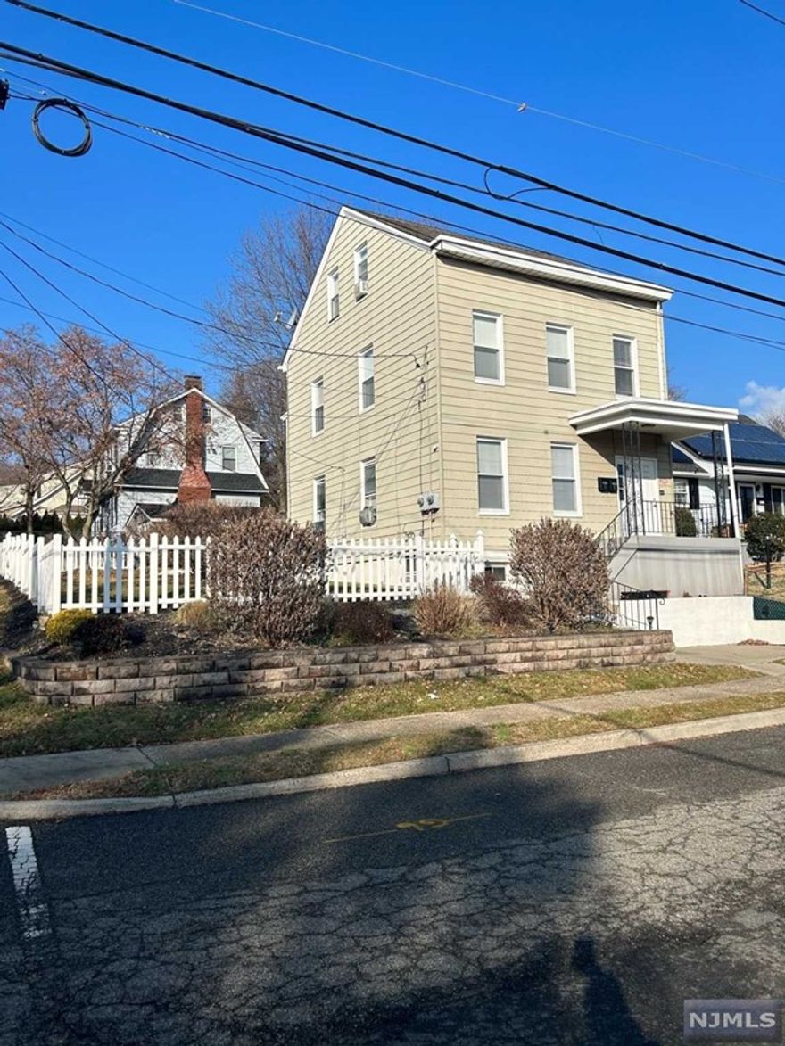 Updated first floor unit with a large living room, spacious eat-in kitchen, 2 bedrooms and an updated full bath. The kitchen boasts new cabinets, stainless steel appliances, dining area and a pantry for storage. Hardwood floors throughout. Front and rear entrances. Washer & dryer in basement for your unit specifically. Yard use allowed. 3 window AC units already in place. Plenty of close on street parking as the home sits on a very large piece of corner property. Short distance to NYC transportation, and just a short drive to Routes 3 and 46, the Garden State Parkway, and Montclair State University. No pets. Available immediately.