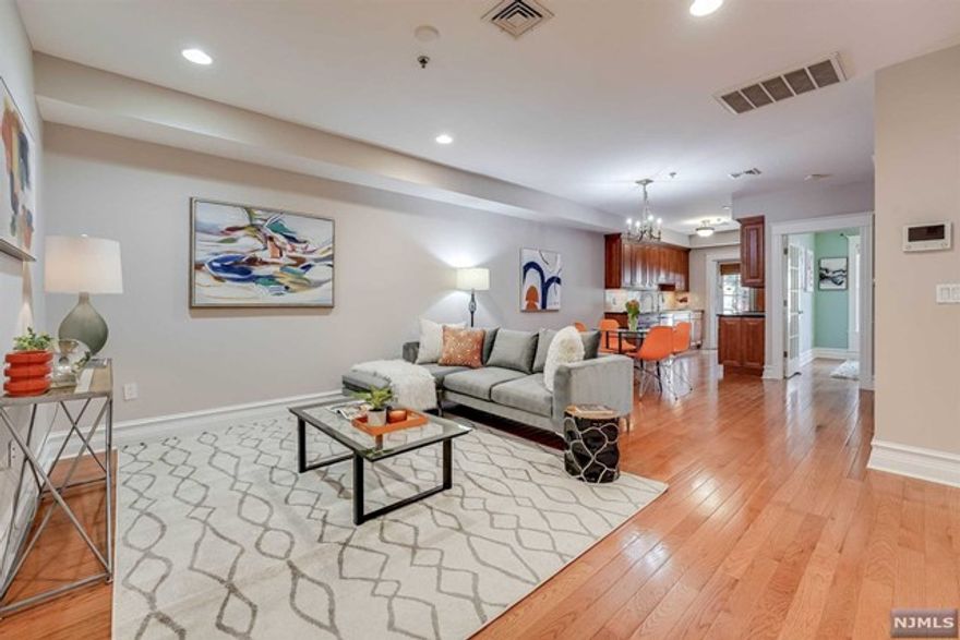 Looking for a PRIVATE DECK & BACKYARD? Look no further. This 1100 sq ft 2BD/2BA in the heart of downtown Hoboken, minutes from the Path, has it all! This spacious move-in ready home features a generous open floor plan with a huge dining area with room to spare for a home office. The kitchen boasts granite countertops, stainless steel appliances, beautiful Thomasville cabinetry and an abundance of cabinet space. The kitchen flows beautifully through a glass door onto a large deck and a massive backyard, perfect for entertaining. Tastefully built in 2006, this home features gorgeous custom woodwork throughout, classic tumbled marble bathrooms and bespoke shutters in the primary bedroom for additional privacy. Other highlights include custom built-ins in the many many closets throughout the house, recessed lights, pristine oak hardwood floors, a tankless water heater, in-unit washer/dryer, an attic-like storage space, plus additional storage under the deck.