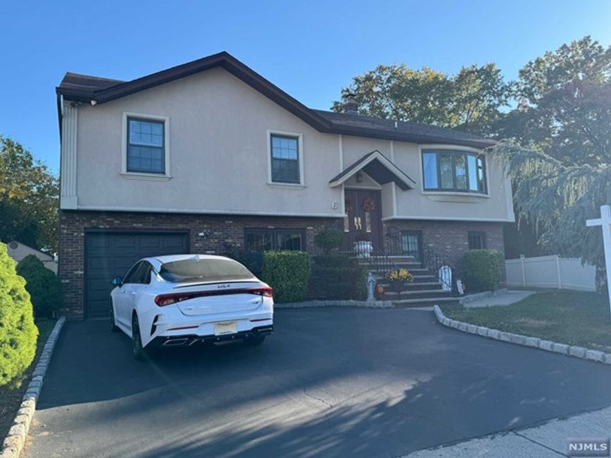 Renovated clean and bright ground floor, 2 BEDROOM apartment on quiet cul-de-sac. No steps! Enter through private door into spacious FAMILY ROOM. The crisp white UPDATED EAT-IN KITCHEN is equipped with stainless-steel dishwasher. Hall leads to huge ((21' x 12') king-sized PRIMARY BEDROOM with double closets and room for sitting area or home office. Generously sized 2ND BEDROOM has large closet and updated flooring. BRAND NEW FULL BATH. Full sized Samsung WASHER/DRYER IN UNIT. Newer CENTRAL AIR, 2 OFF-STREET PARKING SPACES INCLUDED. Tenant to supply own fridge. Landlord provides cold water and lawn care. Tenant responsible for own gas and electric. Owner occupied, no use of backyard. Quiet residential area of Elmwood Park close to transportation, parks, schools and shopping. Credit check, income verification and interview required. 1.5 month security deposit and 1st month's rent due at lease signing. NO SMOKING OR VAPING and NO PETS please.