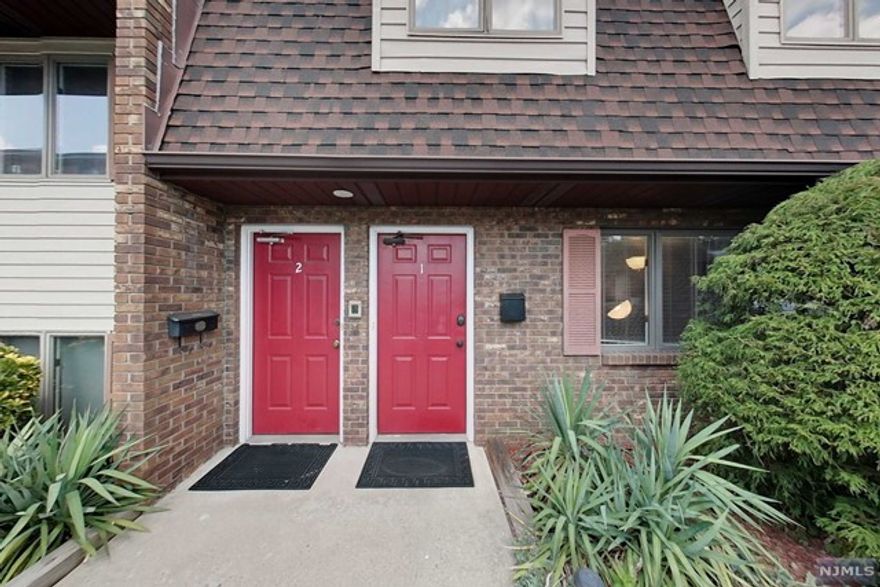 SPACIOUS AND BRIGHT END UNIT WITH UPDATED KITCHEN W/NEW APPLIANCES, CONDO IN DESIRABLE LOCATION OF GARFIELD. NEWER C/AC,NEW FURNACE,New Water Heater, TWO PARKING SPACES,STORAGE AND COIN OPERATED LAUNDRY IN THE BASEMENT.LOW TAXES, LOW MAINTENANCE, CONVENIENTLY LOCATED NEAR NYC AND LOCAL TRANSPORTATION!