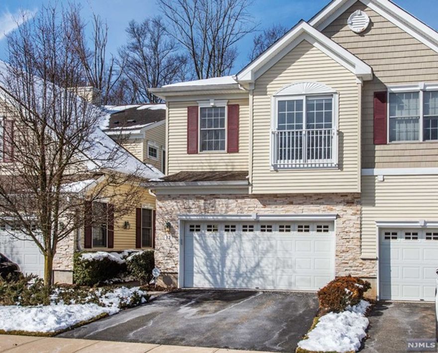 Nestled in the desirable community of Roseland Green, this stunning townhome offers the perfect blend of comfort, convenience & style. Step inside this 3-bedroom Cedar Model to discover a spacious & light-filled interior, featuring hardwood floors throughout, high ceilings & numerous upgrades. Elegant crown molding, oversized baseboards & trim add a touch of sophistication. The kitchen is complete with quartz countertops & modern appliances. Natural light pours through the beautiful windows into the living room & den with a gas fireplace. Conveniently situated on the 1st floor is a powder room. Upstairs, you'll find a generous-sized primary bedroom w/custom closet, en suite bathroom w/jetted tub & stall shower. 2 additional bedrooms with a large full bath & an airy loft! The bonus 3rd floor offers a versatile space. This is a must see unit!