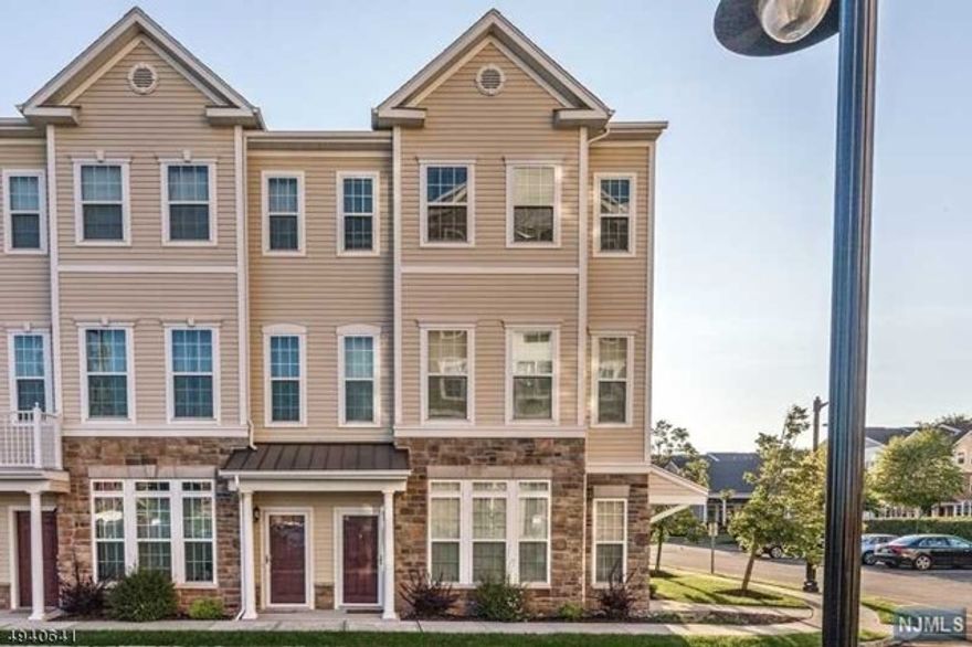 Welcome to Signature Place in Davenport Model -End Unit approx. 1700 SF, 2 bedrooms, with a possibility of 3rd BR or a Den/Loft, 2.5 Bath, with attached 1 car garage. This home boasts upgrades including Maple 42 inch cabinets, Granite Counter Tops & Stainless Steel appliances, Recessed Lighting & hardwood floors in living and dining room & Foyer. This house is flooded with abundance of natural light. Overlooking clubhouse with outdoor pool, very quiet location to visitor parking...Signature Place community is only 10 miles from New York City and 1 mile to the train station, perfect location for commuting. Great Amenities includes Clubhouse with lounge, pool, Billiard room, Gym, kitchen, outside patios and beautiful pool.