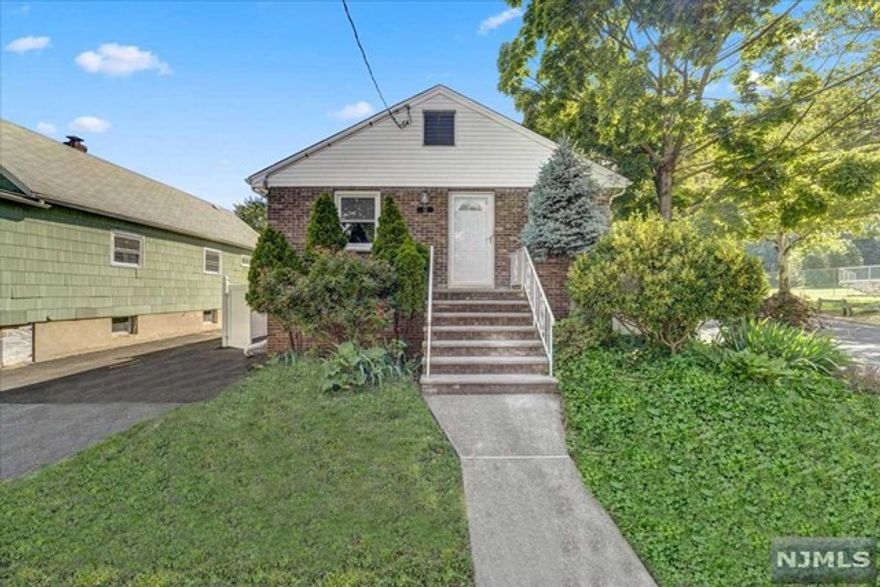 Beautiful & spacious fully renovated, freshly painted Ranch style home located in the most desirable section of Wallington! Directly across from the gorgeous 17-acre Samuel Nelkin County Park, enjoy activities like tennis, basketball & baseball or a peaceful stroll around the lake. Situated on a corner lot w/ 2 separate driveways for ample parking. Large fenced in private yard has a patio, tool shed & a fully finished man-cave or she-shed complete w/ new floors, overhead lights & electricity. 1st floor includes the living room, eat in kitchen, 2 bedrooms & a full bath. Updated kitchen features new stainless steel appliances, quartz counters & tons of cabinet space. Finished walk-out basement boasts a family room, play room, office, full bathroom & laundry room w/ washer & dryer. Both bathrooms have been fully renovated. Equipped w/ Central Air. Commuters paradise, close to Rt 3, 17 & 21, only minutes to Rutherford & Westmont Train Stations & NYC Buses! Not in a flood zone!