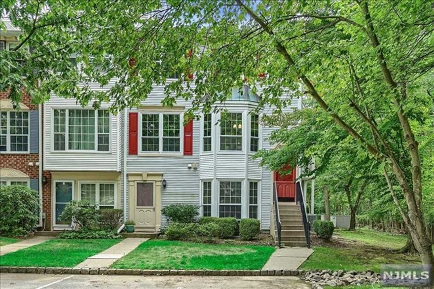 Welcome to this rare private end unit. This townhome offers space, character and a sensational layout. Off an entryway, you will find a light filled eat-in-kitchen with double sliding doors to a deck surrounded by a serene wooded setting. The open concept dining room and living room are marked by a beautiful fireplace. A half bath completes this floor. On the second floor there is a spacious primary bedroom and stunning primary bath, a second bedroom, a full hall bath and laundry. This townhome truly gives you privacy and comfort, yet still offers carefree living. Enjoy the pool, forget the hassle of outdoor maintenance, appreciate easy commuting access, low taxes and laid-back living. Don't miss this one! WANT MORE INFO? CONTACT LISTING AGENT NICOLE MINETTI @ 201-388-0077 or nicole@minettidennisgroup.com