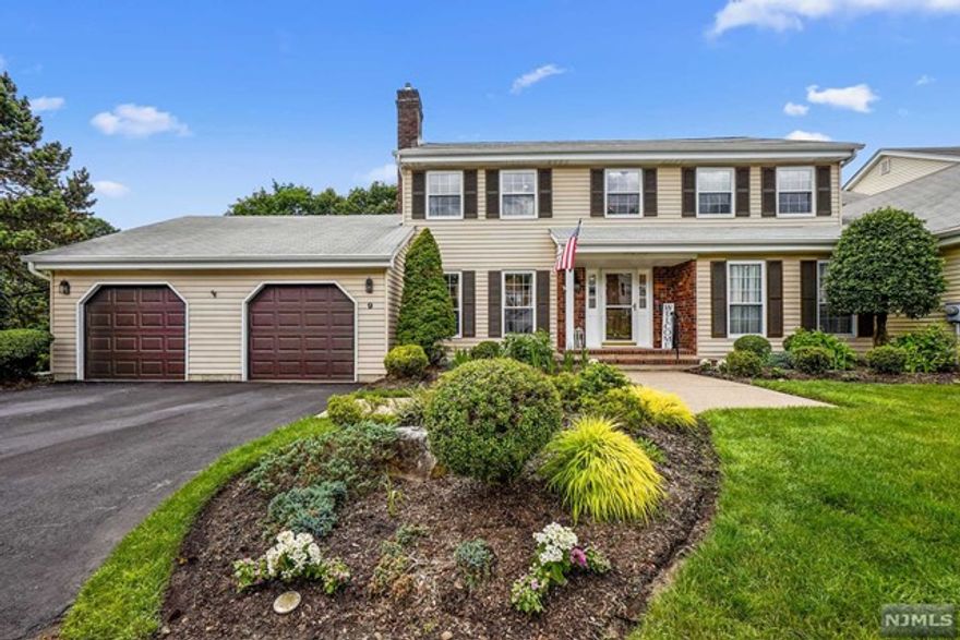 STUNNING! Recently renovated (2019) this updated end-unit townhome is sure to wow! As you enter, find a warm and welcoming living room that opens into an oversized dining room where you can imagine entertaining day after day. The updated bright kitchen featuring custom cabinetry and an oversized island with storage is truly impressive. The open floor plan allows for the kitchen to flow freely into the family room where you will have countless laughs and make plenty of memories. Off the eat-in-kitchen is an oversized deck perfect for meals and gatherings with a spectacular private view of the sunsets. A powder room (2019) completes the first floor. Upstairs you will find the updated primary bedroom suite (2019) complete with walk-in closet and private bathroom. Two other generously sized bedrooms and a hall bath (2020) complete this floor. The basement boasts more storage, potential family room space, and a walkout to a lower deck and private back yard.