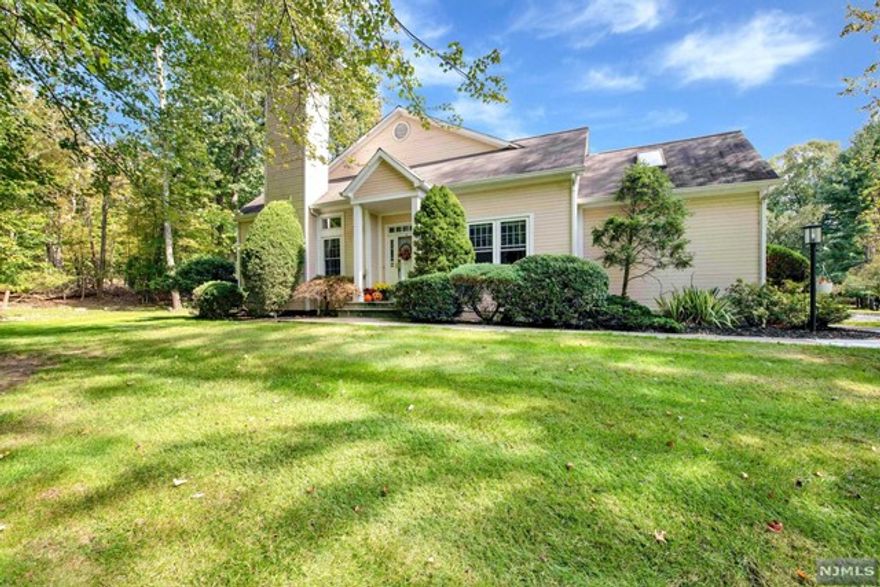 Desirable Ranch style town home in the Woods at Waterview Estates!This 3 bedroom, 2.5 bathroom unit offers wonderful floor plan, perfect for entertainment and everyday life. Living room with high ceiling and marble faced fireplace flowing to formal dining room w/vaulted ceiling and french doors leading to over-sized deck that backs up to private woods.Master bedroom w/master bath and two walk-in closets, Large modern eating kitchen with newer appliances, breakfast bar, quartzite countertops, new windows, finished basement, two car garage and more... Enjoy The Waterview Woods beautiful private pool and tennis courts!