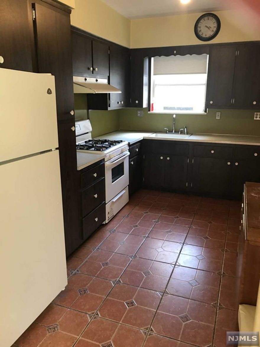 First floor apartment of non-owner occupied 2 family. Unfinished basement with w/d h/u, use of yard, driveway parking. Refrigerator supplied in as-is condition. Heat, hot water, cooking gas included. Tenant pays electric. Tenant responsible for snow removal, landlord responsible for landscaping. Pet considered. Close to school, NY bus, shops.