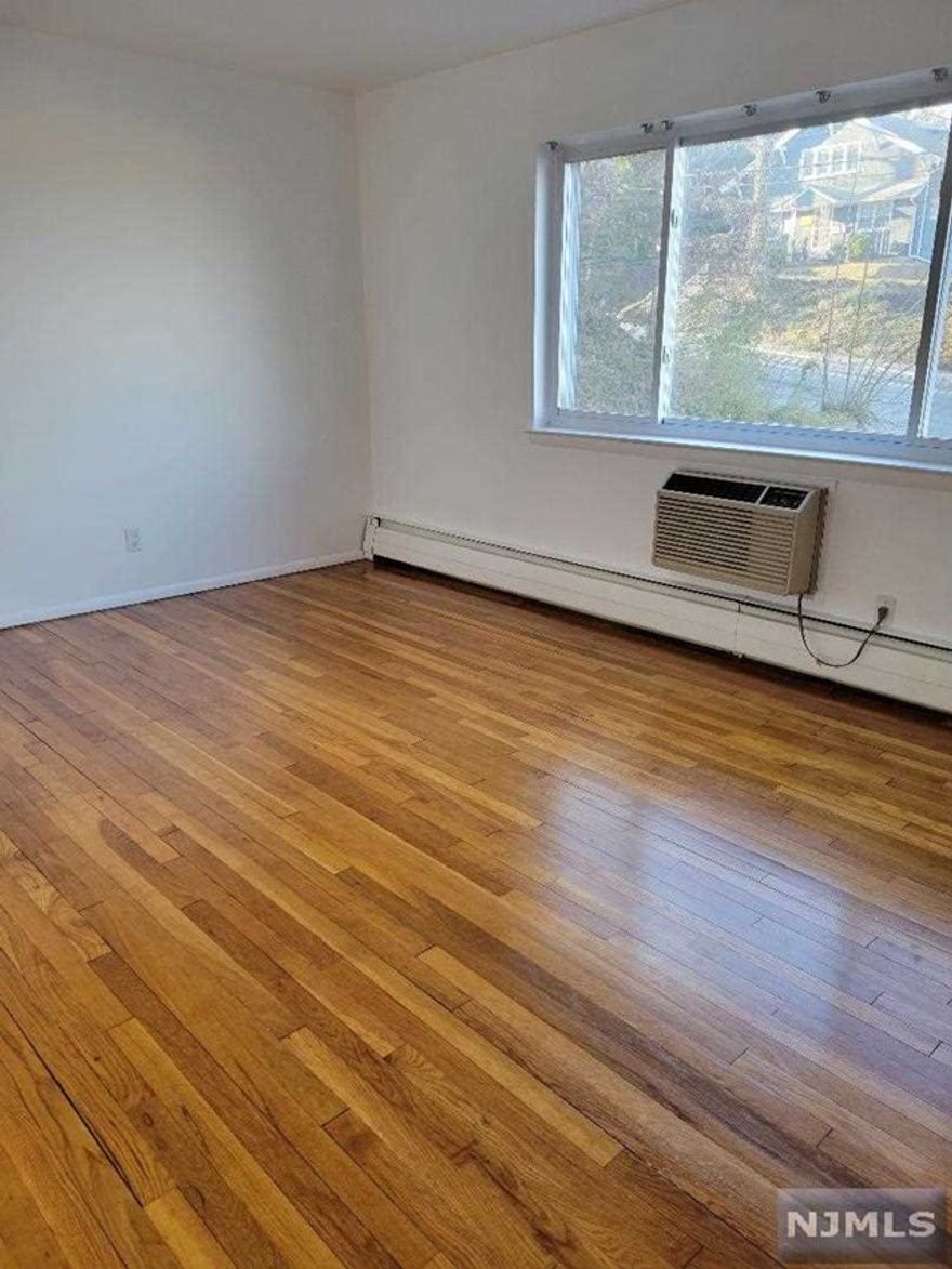 Spacious light and bright apartment. This first floor apartment has a large living room with picture window, full bedroom double closet, updated eat in kitchen, refrigerator included, newer tile bath. Laundry, coin operated on ground floor. Private storage area. One car garage. Close to transportation. Landlord pays heat and hot water. tenant pays electric and small gas bill for stove.no washer or dryers allowed in the apartment. laundry on premises. No pets. recent credit report with application and interview