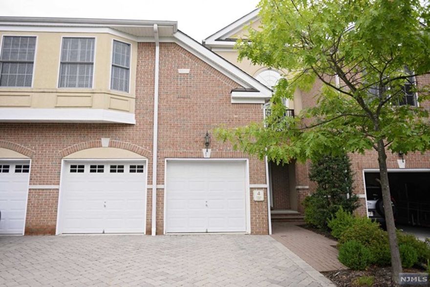 Stunning townhome w 2 car garage available Oct 1 in fabulous Cedar Gate. Great location! 25 mins via car into NYC; every conceivable shop/restaurant within 15 min drive. This elegant and impressive home offers hardwood floors and granite counters and is epitome of luxurious living. Rear deck faces conservation land so offers privacy from road and traffic noise. Finished basement w full bath and possible office. New carpet. Kitchen offers view into living and dining room due to modern and open floor plan. Upstairs are 3 generous bedrooms and 2 full baths along with the convenience of 2nd floor laundry room.