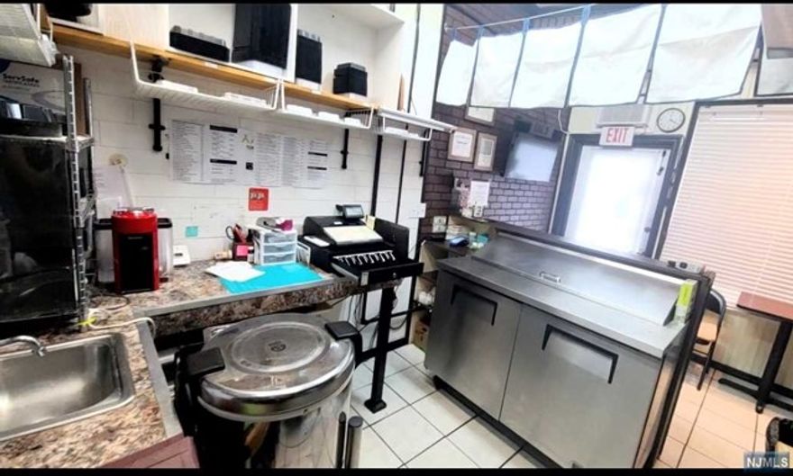 To go Sushi & Japanese Fusion Food. Only opening 4 Days a week/ Wed, Thursday, Friday and Saturday. Most space is restaurant style kitchen with hood. Administration area/ Casher counter, 4 burner Gas Stove/ oven/ hood, Sink, stainless steel Refrigerator, freezer, Counter top, frying area, Pan tray, rest room, back door. 75-80% credit card with phone orders. Rent $800 per month including CAM & water, 5 year and 5 year option still left. Plenty of street parking spaces. Ready to run "TO GO" business