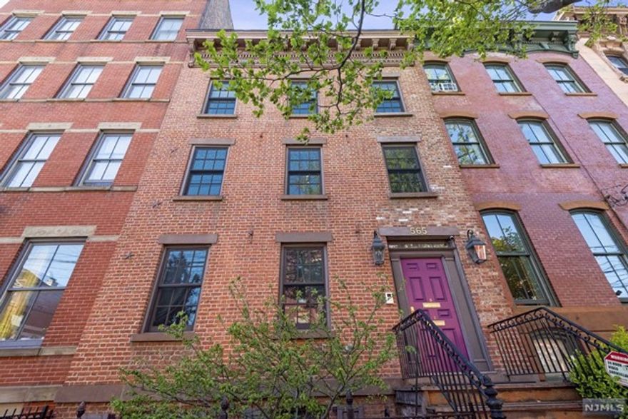 Gorgeous and inviting 3 bedroom 2.5 bath triplex home with glorious verdant roof deck in the heart of Jersey City with only a five minute walk to both Hamilton and Van Vorst Parks, and moments away to Grove street PATH, has been meticulously designed for incredible living. Situated on a tree lined street with all the conveniences of shopping and dining at your fingertips, this 1935 sq. foot beauty is not to be missed. Historic restored exterior brick townhome with 3 Windowed wide frontage to the street and huge windows facing the courtyard, with skylight on top level makes this home light and airy throughout. Gorgeous bamboo hardwood flooring, three levels of fabulous living. Top level contains two additional good sized bedrooms, one full bath and access to an over 500 sq. foot roof garden retreat with views of the city, sophisticated plant and water systems where privacy abounds. The gem that you have been waiting for!