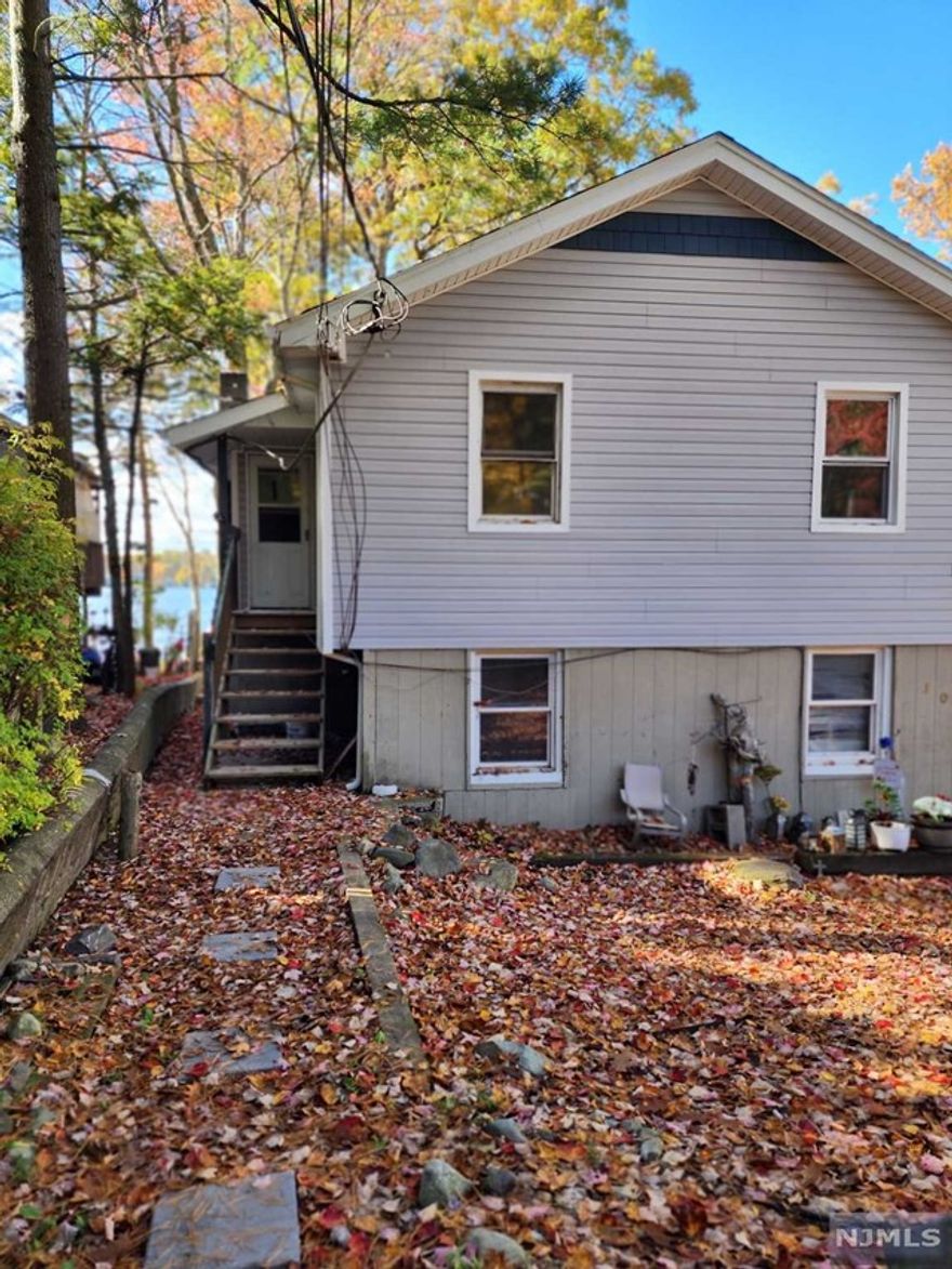 Charming one bedroom + office LAKE FRONT apartment for rent! A perfect cozy hideaway! Enjoy the views and lifestyle of being right on the lake!! Tenant is responsible for all utilities.