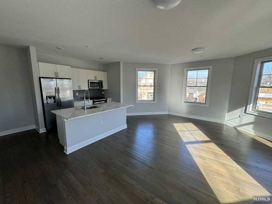 Parking included in rent! 40 Park features modern units with spacious floor plans & high end finishes. Some highlights include: beautiful modern kitchens with stainless steel GE appliances, full kitchen island, wood floors, large washer and dryer in each unit, master baths with large walk-in showers. Blocks away from the train for an easy access to New York. 25-30 lb pet limit (pet fee applies). Within blocks to all Park Ridge has to offer including brand new stores and restaurants. Less than 5 minutes from the brand new Shoppes at Dipiero Farms - featuring Wegmans, Chipotle, Starbucks and much more. Available immediately! Non-refundable $250 move-in fee due at lease signing.