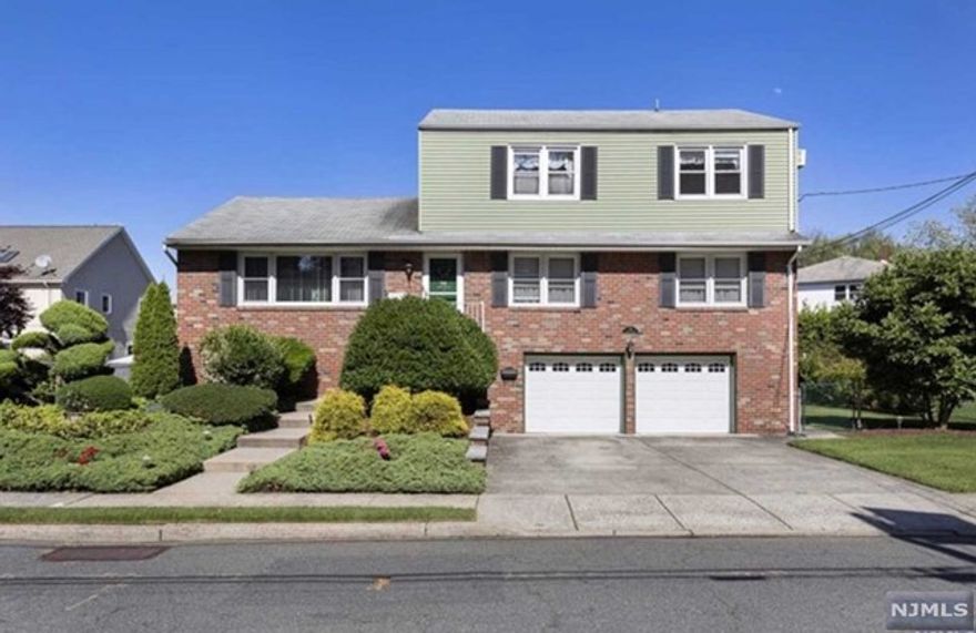 Newly renovated BRIGHT and LARGE 2 bedrooms apartment in a quiet and nice residential area. This unit features WOOD FLOOR throughout, a large living room, dining area, kitchen w/many cabinets, large 2 bedrooms with ample closets. NEW REFRIGERATOR AND Newer LG Laundry in unit. ONE CAR ATTACHED GARAGE AND PARKING SPACES IN DRIVEWAY AND HEAT, HOT WATER, WATER AND LAWN CARE included. ONLY PAY ELECTEICITY AND COOKING GAS. Solar energy for electric/very low utility bills. Very convenient location for NYC transportation and shopping. Don't miss out! No pets allowed! ** Required: 1.5 month security deposit and 1month broker fee, minimum credit score 680 and proof of income.