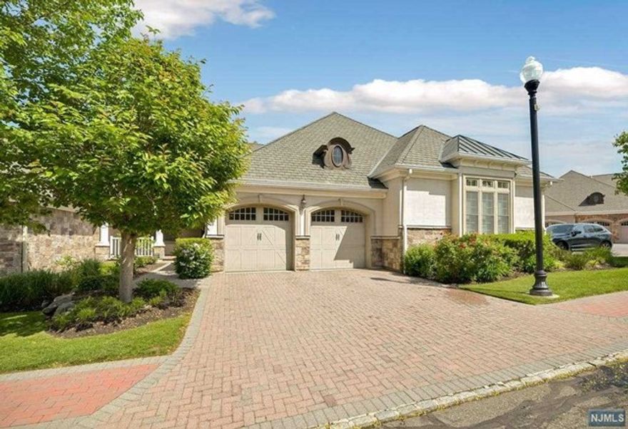 The Bears Cove Gated Community. This 3 Bedroom w/ 3.5 Baths " Carlyle Model " Unit Features Extensive Upgrades Includes Chef's Gourmet Kitchen w/ Viking Appliances, Hardwood Floors, Custom Millwork, Baths, Full Finished Basement w/ Bedroom and Full Bath. Dramatic Two Story Entry Foyer, Formal Dining Room w/ Tray Ceiling, Two Story Great Room w/ Gas Fireplace. The Grand First Floor Owner's Suite w/ En-Suite Bath and Walk-in Closets. Upper Level Offers Open Loft Sitting Area, 2 Bedrooms, Full Bath and Office, Private Deck, Water Softener, Home Owner's Warranty for 1 Year. Amenities In This Complex includes: Salt Water Pool, Spa, Clubhouse w/ Billiard Rm, Gym, Sauna and Kitchen. This Active Adult 55+ Community is Conveniently Located.