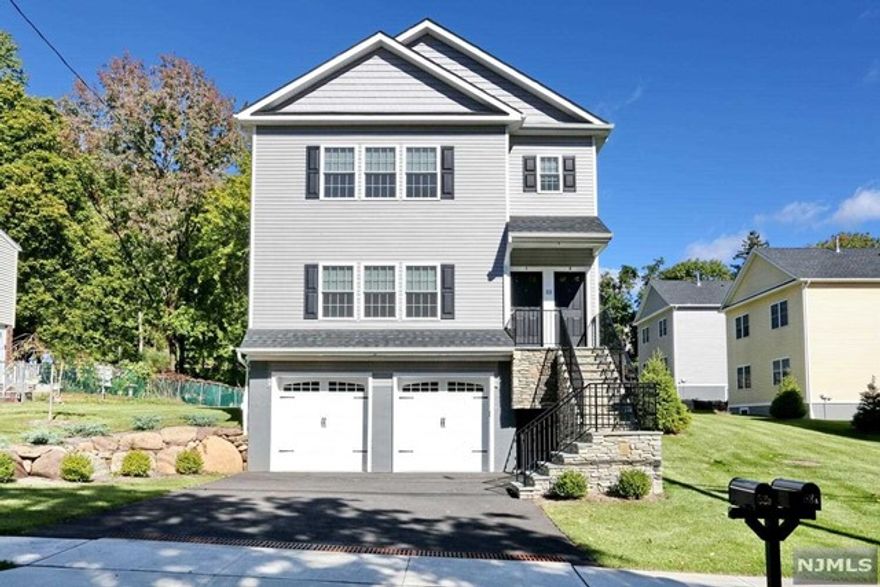 THE PICTURES SAY A THOUSAND WORDS! THESE UNITS HAVE BEEN BUILT WITH THE HIGHEST LEVEL OF CONSTRUCTION! EXTRA INSULATION BETWEEN UNITS, TRIPLE CROWN MOLDINGS, HARDWOOD FLOORING, GRANITE, STAINLESS STEEL APPLIANCES, WASHER/DRYER PROVIDED..GARAGES...FINISHED BASEMENTS ON ALL FIRST FLOOR UNITS W/EGRESS WINDOWS THAT PROVIDE MAXIMUM SUN; ROOM DARKENING SHADES;CENTRAL AIR, PLENTY OF STORAGE, IN A COMMUTER TOWN! 2500 SQ FT OF LIVING SPACE PLUS APPRX 500 SQ FT OF GARAGE SPACE! A MINUTE FROM THE HIGHWAY..TRULY A GEM! DON'T HESITATE!