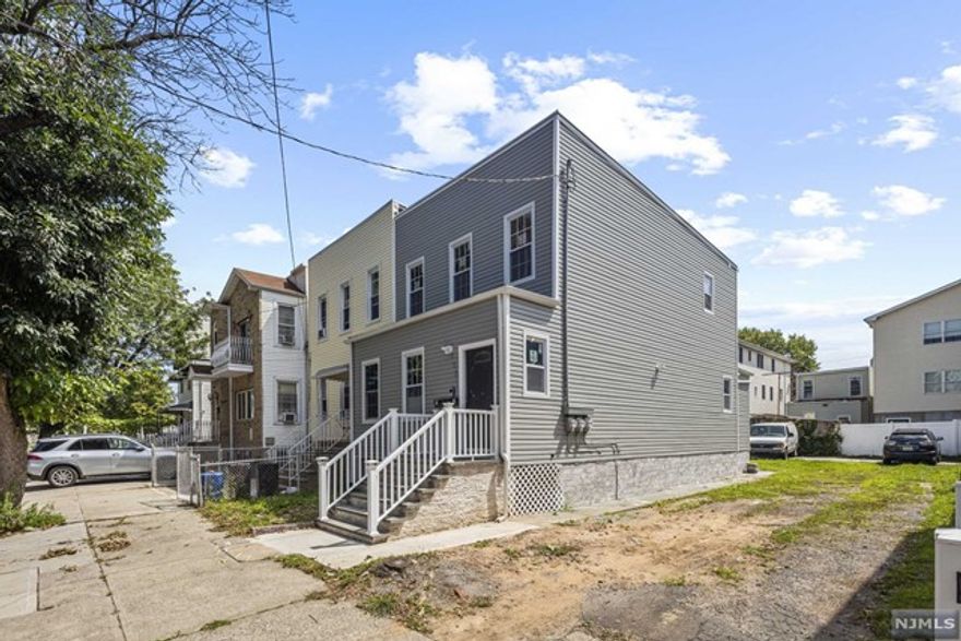 Welcome to this stunning new construction in the heart of Jersey City, offering modern living with top-of-the-line features. This unit boasts central air and heat, luxurious Bruce hardwood floors, and high-quality Anderson windows. The kitchen is a chef's dream with quartz countertops and brand-new Samsung appliances. Enjoy direct access to a private backyard, perfect for relaxation or entertaining. Located in a prime area, you're just steps away from convenient transportation options, including the Journal Square PATH station for easy access to NYC. Nearby, you'll find Lincoln Park, a vast urban oasis perfect for outdoor activities, and Pershing Field Park, known for its sports facilities and ice rink. The area also offers excellent shopping options, with local boutiques and major retailers nearby. For your everyday needs, a laundromat is just around the corner, adding to the convenience of this fantastic location.