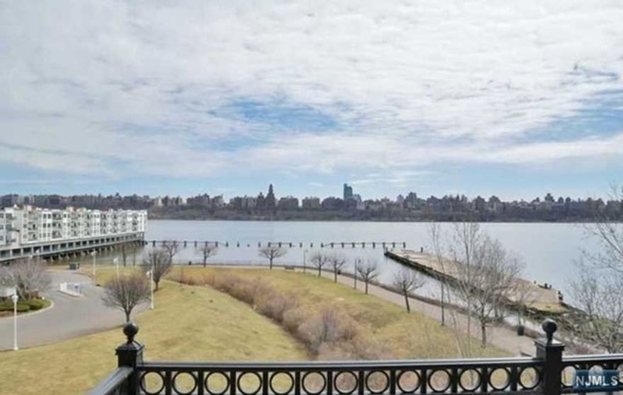 Exquisite hard to come by corner 2 bed, 2 bath unit with full River views, NYC skyline, high ceilings and balcony! Boasting over 1600 sq ft, east facing, sunny & bright apartment. For the chef in you, a state of the art kitchen with SubZero frig, Gaggenau professional oven & dishwasher, granite countertops and pantry. Soak in the spectacular views from spacious living area and dining room. Large master suite with unobstructed views of River, walk in closets and spa-like bath including Jacuzzi tub, Kohler faucets, double sinks and granite counter. Generous sized second bedroom with built-in closet and full bath. Open entry foyer, extra large Samsung washer/dryer, new HVAC, and hardwood floors throughout. Easy commute to NYC, great boutiques, top notch restaurants, and so much more to see! JUST PAINTED CRISP CLEAN WHITE COLOR!