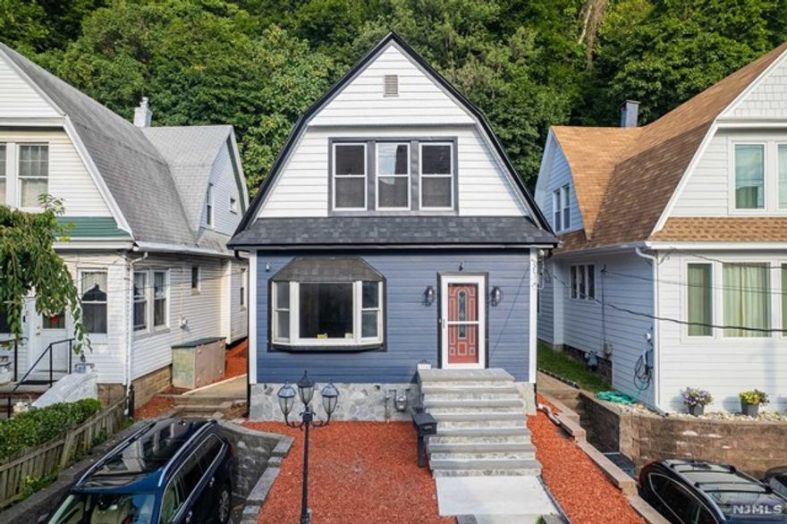 Totally renovated in the most desirable neighborhood of Edgewater, 1st FL features living room, dining room, large custom kitchen with walk out to the backyard, and powder room. Outside Deck. 2nd FL features Master Bedroom,2 bedrooms, full bath. Enjoy the privacy of the fenced backyard. It offers great school system and walking distance to NYC transportation, shops, and restaurants, this is the perfect location for any family. Home offers beautiful hardwood floor throughout with plenty of natural light. Finished basement with lots of storage space and laundry. Tenant is responsible for all utilities, lawn maintenance and snow removal. Credit/NTN report, proof of income required.