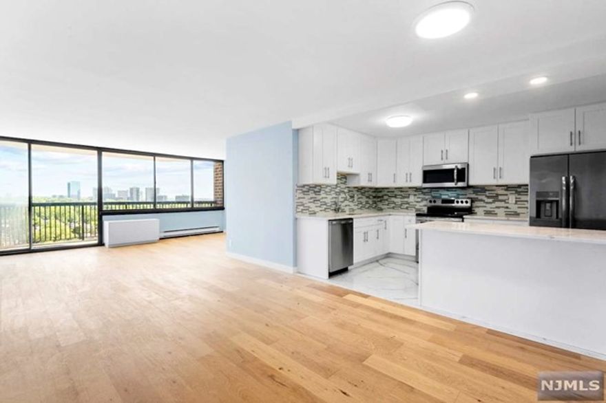 If you were looking for a freshly renovated home in a full service building - look no further! Be the first one to enjoy this completely updated, sun filled apartment with NYC and GWB views. Gorgeous open kitchen, spacious living room with access to your private terrace, half bath for convenience of your guests, separate master suite with a huge walk-in closet and a marble bathroom - ideal layout. The unit comes with a storage unit and a parking spot, and all utilities are included in your maintenance. Greenhouse is a full service condominium with 24 hour doorman, gym, outdoor pool, sauna and a community room. Easy commute to NYC!