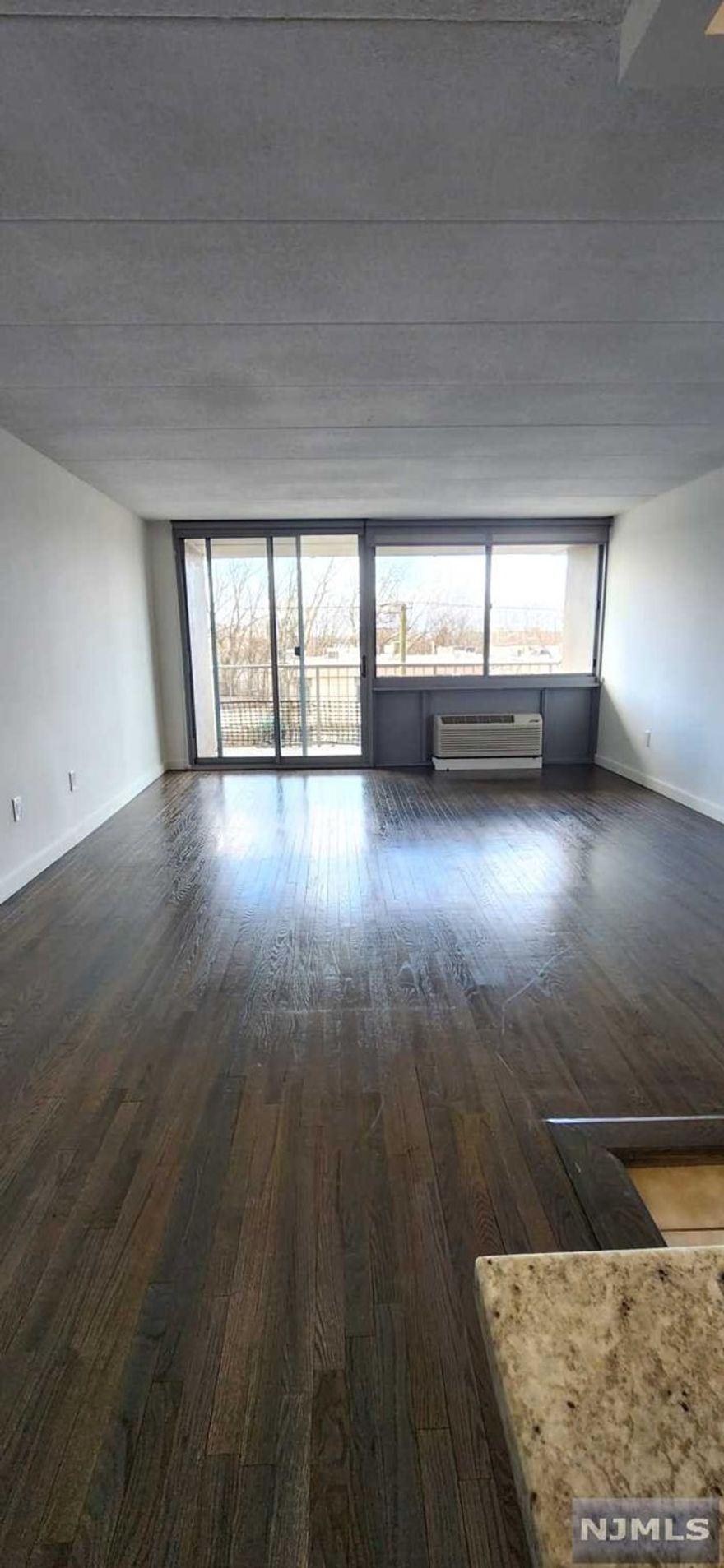 **Rent is $2,545.83 with 1 month free. Option to pay $2,350 for 13 month. This apartment features newly finished kitchen with large island, hardwood floors, large windows, balcony and more! YES, ALL UTILITES ARE INCLUDED! LL covers your WATER & ELECTRICITY. PET FRIENDLY! Oversized windows allow lots of natural light into this lovely home. Move right in and enjoy the convenient lifestyle of walking to shops, markets, schools and much more. Just steps to NYC transportation and minutes' drive to NYC. Morning to evening concierge service, 24 emergency maintenance, indoor garage parking & limited outdoor parking spaces for additional fee, mall level access to shopping, pet walk and so much more! On-site storage space and garage parking available for additional cost.