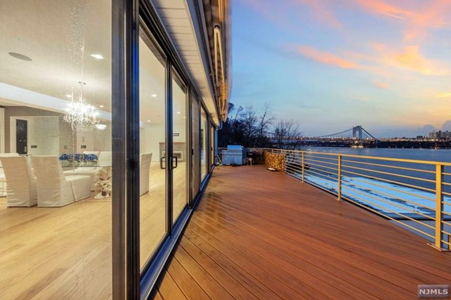 *The VIRTUAL TOUR link for this listing contains an enormous amount of relevant information including a comprehensive video tour with hidden features & room dimensions, written description, additional photos, floor plans, and a complete interactive 3D model of the home.* Looking for pristine, modern luxury with panoramic views and easy access to Manhattan? This contemporary home in Edgewater's most prestigious neighborhood has it all and more. Breathtaking views from every room. Features include Maintenance free deck and exterior, steel roof, elevator, Porcelanosa kitchen and baths, Thermador appliances, radiant heat throughout, Sonos wireless sound system, motorized shades and awning, sprinkler system, LED lighting, gas fireplace, 2 car heated garage, whole house generator, finished walkout basement, and private fenced in yard. TOTAL TAXES $24,228 (LAND TAX $6781.12 + HOUSE TAX $17,446.88) / YEARLY MAINTENANCE $6771.20