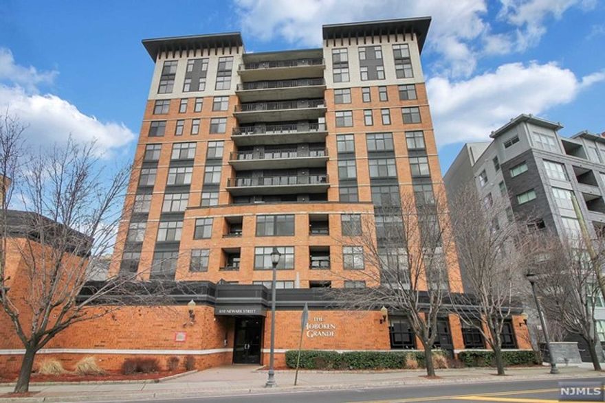 Beautiful modern 2 bedroom, 2 bathroom apartment in a high rise elevator building. This corner unit features an open floor concept with large windows, high ceilings, private balcony, updated kitchen with a breakfast bar, stainless steel appliances, washer & dryer, oversized california closets, central air/heat. The building amenities include a doorman, elevator, new van shuttle to the PATH, fitness center with sauna & steam room, large common patio/deck area, On-site dry cleaning pick up & drop off. 1 car garage parking included. This amazing apartment won't last !