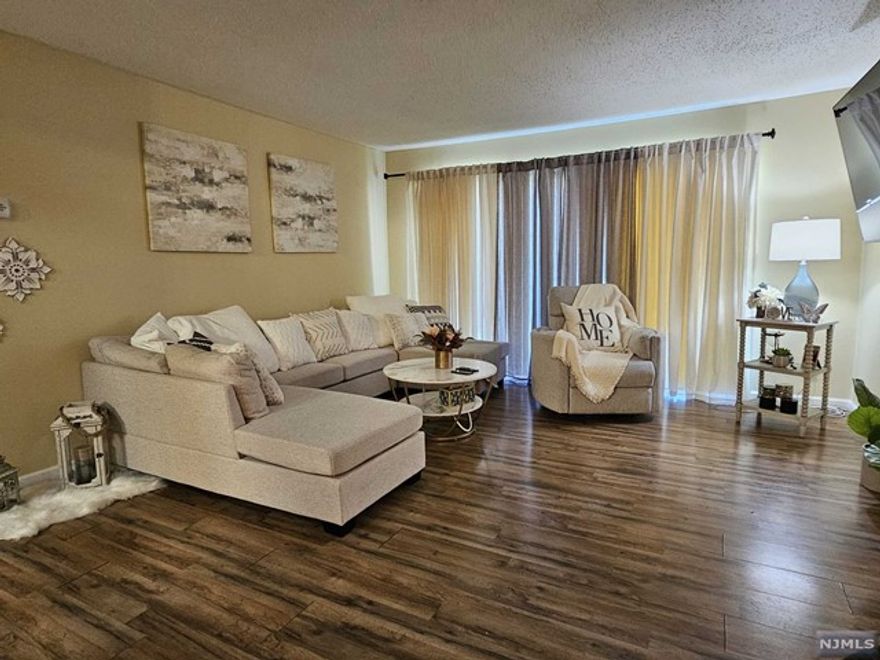 Wow! Beautiful Updated 1ST FLOOR UNIT is available just in time to enjoy Summer Poolside! First Floor =NO STEPS! All appliances including Washer & Dryer are in unit! Laminate Floors throughout whole unit and recently painted! Spacious Primary Bedroom with Walk In Closet and Full Bath! Second Bedroom is also generous in size with double closet. Enjoy the private patio accessed through sliders in the Living Room! Enjoy all that Woodland Hills has to offer- Pool, Clubhouse and Playground in a great location for commuters with QUICK ACCESS TO TRAIN, BUS AND MAJOR HIGHWAYS. No smoking or vaping in unit. SORRY NO PETS. One reserved parking spot for tenant (F-1) . Ample visitor parking available in any spot that is not numbered. Room Measurements are approximate