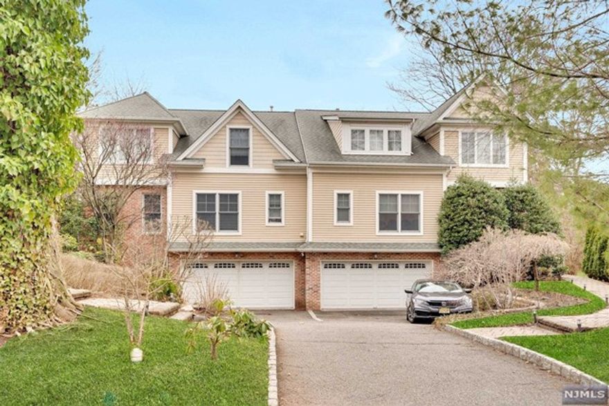 BEAUTIFUL BRIGHT 4 BEDROOMS TOWNHOUSE IN TENAFLY.FIRST FLOOR INCLUDES FAMILY ROOM WITH GAS FIREPLACE, DINING ROOM, LIVING ROOM, POWDER ROOM, LAUNDRY GOURMET KITCHEN WITH LOTS OF CABINET SPACE AND A LARGE ISLAND, DOORS LEAD TO A PATIO WITH PRIVAT YARD, SPRINKLER SYSTEM. HARDWOOD FLOORS THROUGHOUT, CENTRAL VACUUM. SECOND FLOOR INCLUDES MASTER BEDROOM SUITE WITH JACUUZZI, WIC,PLUS 3 BEDROOMS AND A FULL BATH. ATTACHED 2 CAR GARGE AND A FINISHED BASEMENT. CLOSE TO DOWNTOWN AREA, SHOPPING, DINNING, HOUSES OF WORSHIP,SCHOOLS, PARKS. EASY COMMUTE TO MANHATTEN.