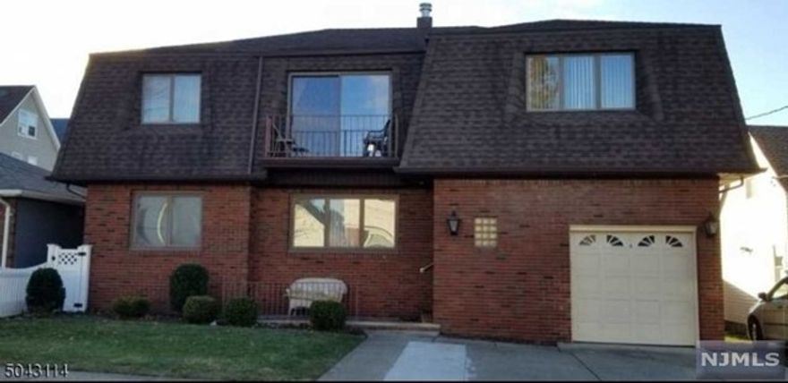 Almost like your own ranch home in a 2-family, first floor unit. 3 bedrooms, full bath, LR, FDR, Kitchen, door to porch and backyard. Basement is walkout, Full kitchen, family room, full bath, own laundry room with storage. One parking space on property--additional free from town on street. Central Air on Main floor. Totally painted interior. NO pets, and NO smoking of any kind, NO satellite dish. Shared responsibility with second floor tenants for Lawn care/snow removal. Easy access to train, bus, schools. CO/Smoke $100