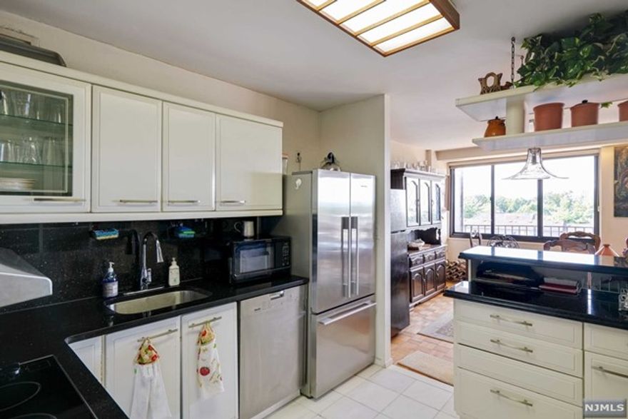 Welcome to this oversized 2 bedroom and 2 bathroom unit which features a large balcony with great Views, wood parquet floors throughout, plenty of Storage and a Spacious Floorpan. Garage parking space and all utilities are INCLUDED! Washer/dryer on every floor in hallway. This luxury building has a 24 hr doorman, exercise room and an outdoor pool. It is located in a very Convenient Location- minutes from shopping, restaurants, parks, and Schools. Express NYC Transportation at your doorstep!