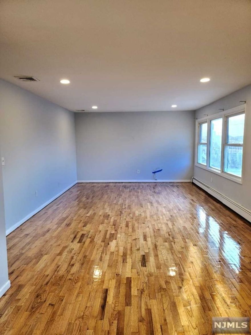 Location Location Location!!! 3bed/2 full bath with deck, freshly painted. All hardwood floor throughout Close to shopping, resturant, and school. Great commute to NYC and all major highways