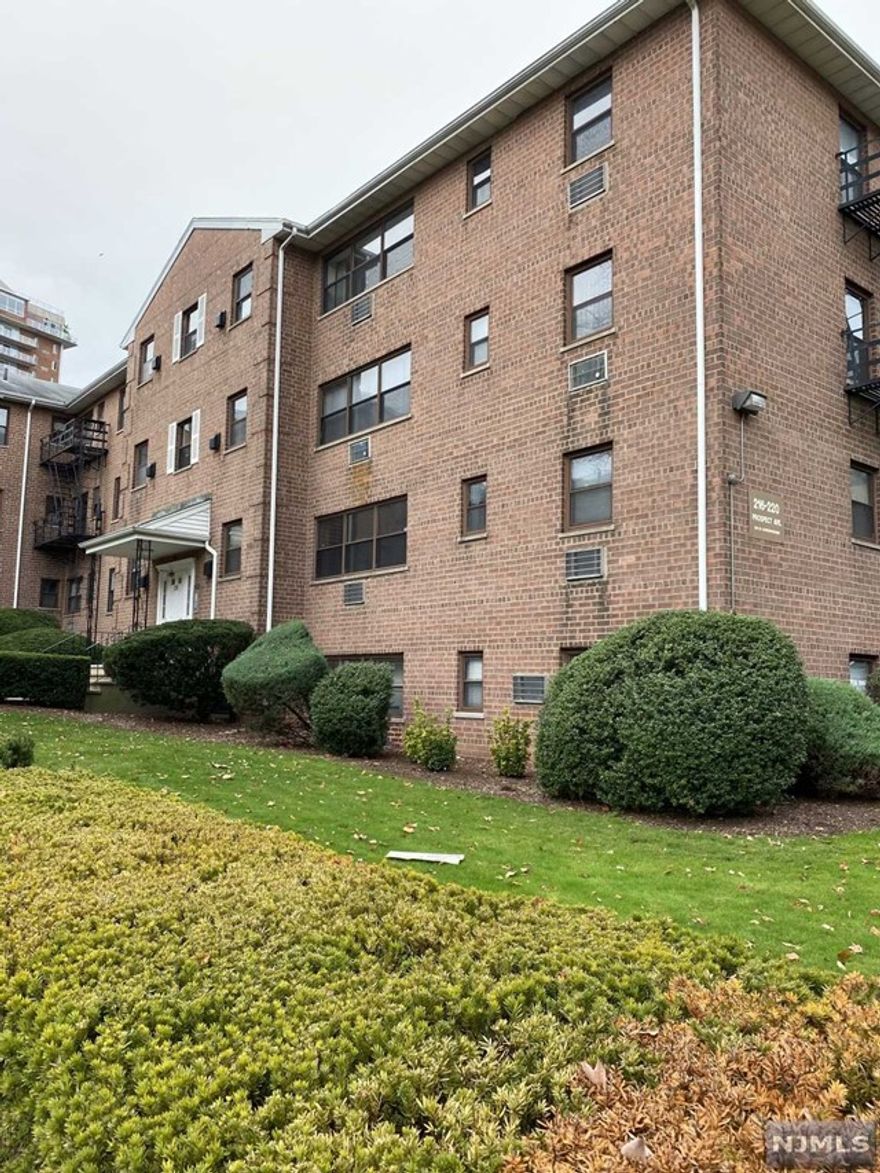Spacious one bedroom unit overlooking beautiful maintained grounds. Kitchen with granite breakfast bar. Gleaming hardwood floors throughout. Large open Living Room with Dining Area. Good size bedroom. Large closets. Gym and Laundry in building with assigned Storage Area and Parking Space. Heat and Water included in rent. Desirable Prospect Ave location close to Hackensack University Medical Center, all major Highways, Malls and steps from NYC bus. A fantastic opportunity. Not to be missed !