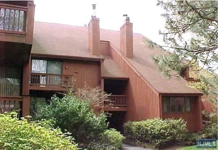 A rare and sought after "York" model has come to market.This condo has been totally upgraded and is beautifully appointed.This is a must see. large living room with fireplace,sliders to terrace.Dining room and a modern kitchen.Entertain or relax on your terrace.Situated amongst lush green landscaping.A master bedroom with plenty of closet space and a master bath. Enjoy the amenity rich community. A resort like feel. Nyc bus at community,shuttle to train station. Easy access to all major highways.Covered assigned parking by your condo.1183 sq ft. of luxurious living!