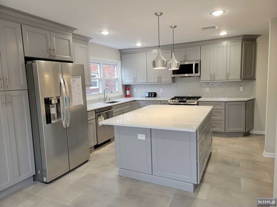 BRIGHT AN BEAUTIFULLY RENOVATED 3BR APPARTMENT ON A FAMILY FRIENDLY STREET. BRAND NEW KITCHEN AND BATHS. FRESHLY PAINTED. BRAND NEW APPLIANCES. WASHER AND DRYER INCLUDED. HARDWOOD FLOORS THROUGHOUT. LOTS OF LIGHT. SHARED USE OF YARD. PARKING FOR TWO CARS IN DRIVEWAY PLUS HALF OF THE GARAGE. CLOSE TO NYC, ALL MAJOR HIGHWAYS, SHOPPING, AND HOUSES OF WORSHIP. LANDLORD TAKES CARE OF LANDSCAPING AND SNOW REMOVAL. FULL CREDIT CHECK, EMPLOYMENT & INCOME VERIFICATION AND INTERVIEW REQUIRED. TENANT INSURANCE MUST BE PROVIDED UPON SIGNING THE LEASE.