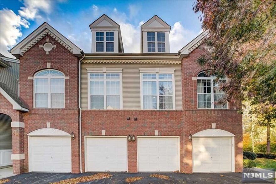 Bright & airy end-unit Townhome in the desirable Riverwalk Community, offering a pool, walking trails & Tennis Court! Ground Floor entrance foyer with access to attached garage. First floor includes main living level with hardwood floors, living room with gas fireplace, gorgeous kitchen with ss appliances, lots of cabinet space, breakfast bar, a dining room and a 1/2 bathroom. Second floor offers two spacious bedrooms, two full bathrooms, laundry room, plus a loft currently being used as a family room. The spacious primary suite includes a large walk-In-closet, Californian closet with built-in shelves, balcony and a primary bathroom with soaking tub, standing shower and double vanity. Great location, close to all major highways and transportation which makes for an easy commute to NYC!