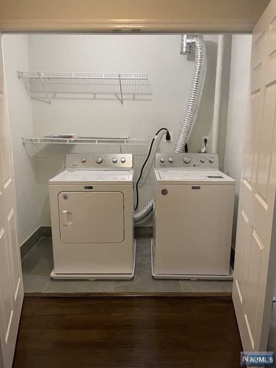 RENOVATED,and Spotless! NO STAIRS NO STEPS..RARE FIND in Prestigious RIDGEWOOD "OAK MANOR" ! LARGE 2 BEDROOM is Available IMMEDIATELY... Cheerfully Bright with Natural Sunlight.....Unique "OPEN" Kitchen with Granite Kitchen Counters, "Gas"Range- Includes Stainless Steel Appliances, Microwave, Dishwasher, Refrigerator,. Hardwood Floors, Large Closets. Included is Bicycle Rack Room ! Washer & Dryer In-Suite (Hard to find)! High Speed Internet, Cable Ready. Entertainment Deck and BBQ Area and Newer Fitness Center. Also included is Parking ON SITE... Garages are optional. Close to Train, Bus and Village amenities. Swimming.. Excellent Schools! On-Site SUPER ! PETS CONDITIONAL --SHORT TERM MAY Be AVAILABLE!(Call for Pricing.) (Photos are similar).. Ask about Studios and 1-3 bedrooms coming up