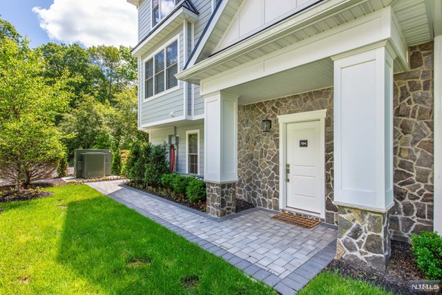 NEWER CONSTRUCTION(6 mo old)! Exceptional PRIME LOCATION! Stunning, beautifully appointed 3 BR,2 Full & 2 HB END UNIT in a luxury townhouse in the highly desirable town of HAWORTH/LAKESHORE ESTATES.A NEW development w/only 32 contemporary townhomes! Situated at the end of a cul-de-sac, facing the park. One of only 3 UNITS with a HUGE BACKYARD for you to enjoy...your own private oasis. Walls of Windows,Premium vaulted ceilings in PBR & maintenance free lifestyle! Enter this elegant sun-filled home to a lovely EF leading to an open layout main floor including Gorgeous Chef's Kit w/huge seated island, high-end appliances & Quartz countertops, DA, spacious LR w/built-ins & contemporary FPL, & pretty PR. Perfect for everyday living & entertaining. The 2nd floor offers the LUX PBR with sumptuous bath & 2 large WIC's,2 BR's,FB, & Laundry. The walk out LL has expansive Rec Rm,.5 bath & storage.2 car Garage. Train and Bus to NYC nearby. Top schools! You will love living here!